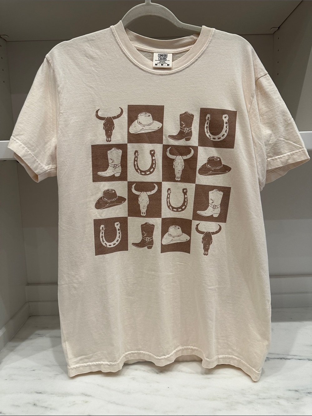 Comfort Colors medium cream with western motif tee shirt. Like new